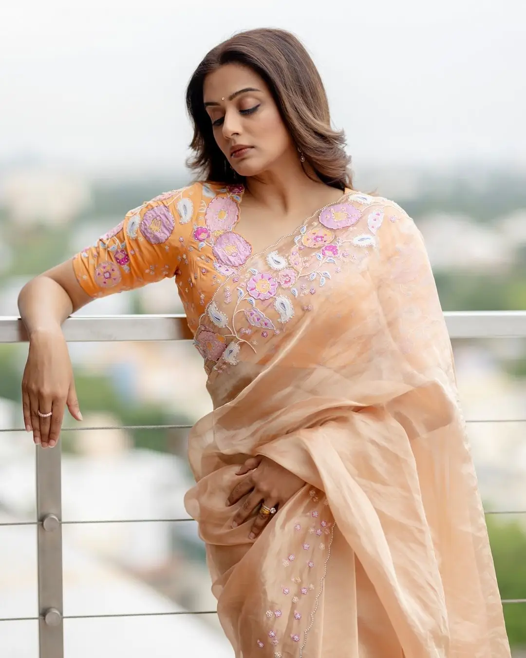 PRIYAMANI MESMERIZING LOOKS IN BEAUTIFUL DESIGNER ORANGE SAREE 8